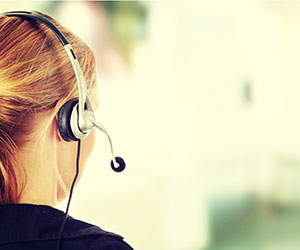 Call centre worker wearing a headset