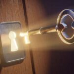 Unlocking loyalty concept with key being put into glowing keyhole