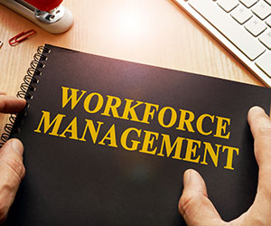 Workforce management written on notepad