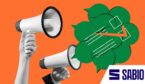Hand holding megaphone with paper and checkmark