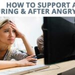 Upset and stressed person sat at computer