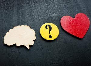 Emotions, questions concept with brain, heart and question mark