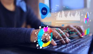 Graphs and metrics above laptop screen