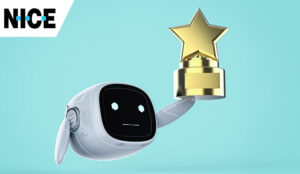 Mini robot holding a gold trophy