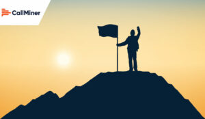 Person on the mountain in the sunset holding a flag