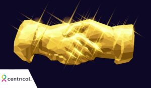 Partnership award concept with golden hands shaking