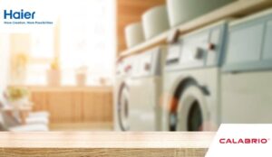 Blurred home laundry room with wooden table