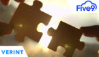 Two hands trying to connect couple puzzle piece with sunset background