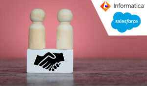Wooden dolls and wooden cube with handshake icon