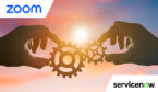 2 hands putting together 2 cogs - partnership concept