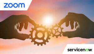 2 hands putting together 2 cogs - partnership concept