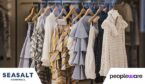 Lots of summer clothes on a rail