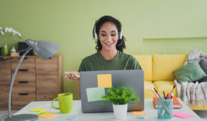 Women working as a call centre agent from home.