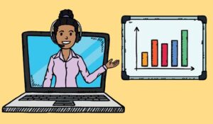Smiling businesswoman on laptop pointing at analytics chart.