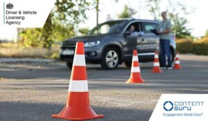 Examiner instructing student before exam at driving school test track, focus on traffic cone