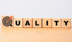 The word Quality on wooden blocks
