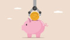 Robot hand putting money into a piggy bank