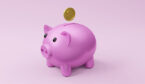 Piggy bank with a coin going in