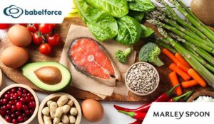 Many different healthy food on white table