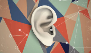 Hearing concept with an ear on a colourful background