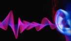 An ear with sound waves coming out of it on a black background