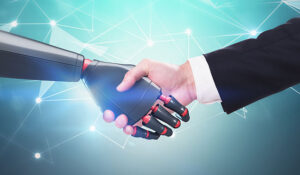 Robot hand holding human hand