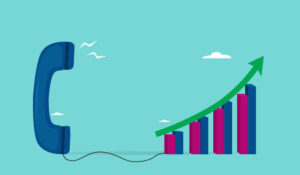 A phone attached to a graph with a positive correlation