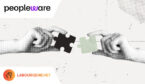 2 people pushing together a puzzel piece
