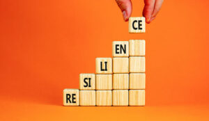 Concept of building resilience with blocks with the word