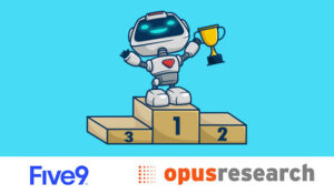 Robot stood on the top of a podium holding a trophy
