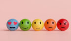 Five faces on a pink background