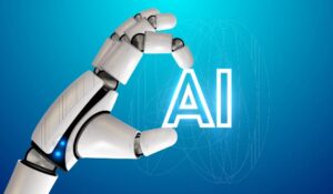 Robot hand holding the word AI