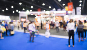 Abstract blur people in exhibition hall