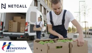 Worker carrying boxes of vegetables.