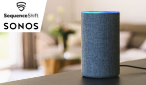 Smart speaker on a table with a blurred background
