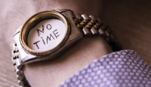 A watch with the words no time - not having time concept