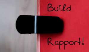 A red note with handwriting BUILD RAPPORT