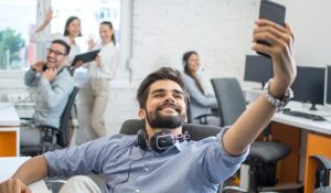 Person taking a picture in a Contact Centre