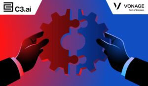 2 people putting cogs together