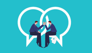 An illustration of two businessmen sitting on intersecting speech bubbles giving high fives