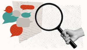 A hand holding a magnifying glass over a piece of paper with speech bubbles