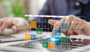 A person using a digital calendar to manage schedule
