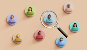 People icons with a magnifying glass