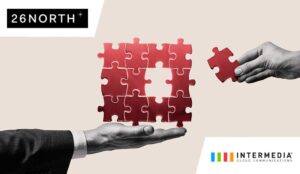 Person placing the last jigsaw piece