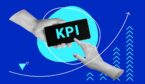 The hand touches the abbreviation KPI on the smartphone screen
