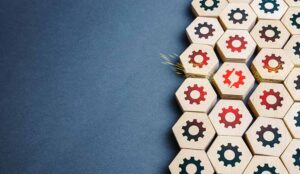 Breakdown and failure concept with a cog broken and impacting others