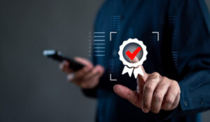 Person holding phone with checkmark