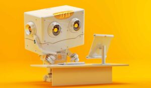 Robot working at a computer on a yellow background