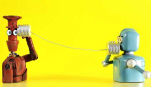 2 Vintage robots on cup phones