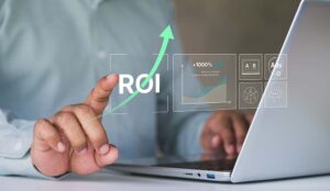 ROI concept with person on laptop with overlay of ROI and graphs